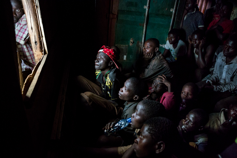 children watching tv in kampala