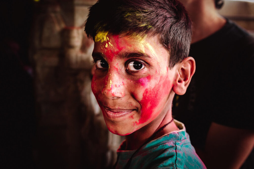boy with the face full of colours